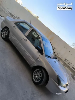 لانسر 2009 للبيع 10