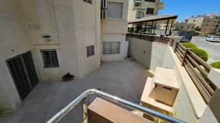شقة ارضية للبيع في ضاحية النخيل 11