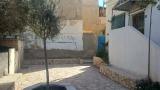 شقتين طابق أرضي لقطة نظاف 4