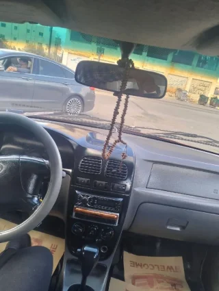 سياره كيا ريو 2002خالي قص قلبان قير اوتوماتيك منتهي ترخيصها الها 6شهورسعر البيع 2
