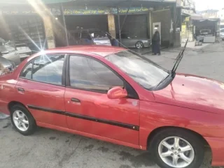 سياره كيا ريو 2002خالي قص قلبان قير اوتوماتيك منتهي ترخيصها الها 6شهورسعر البيع 4