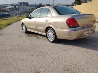 نيسان صني 2004 محوله ٢٠١٢ فحص ٣جيد واحد مضروب 6