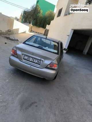 لانسر 2009 للبيع 14