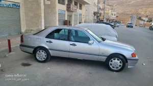 بسم الله الرحمن الرحيمللبيمرسيدس بنز C200 موديل 1997 أصلي لون سلفرماتور 2000cc ا 4