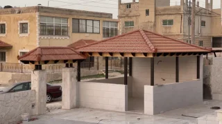 الديرباني لاعمال القرميد والديكورات الخشبية الخارجية