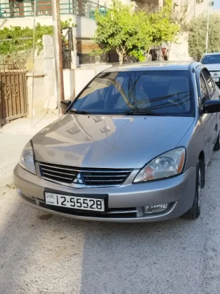 ميتسوبيشي لانسر 2004 4