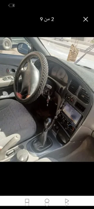 كيا شوما ١٩٩٩ للبيع مرخصة سنة كاملة بحاجة لدهان 2