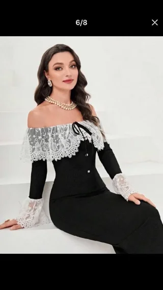 فستان أسود طويل بقصة أنيقة ومميزة، مزين بطبقة دانتيل رمادية على الأكتاف وأساور د 3