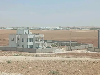 أرض للبيع قرب شارع المطار