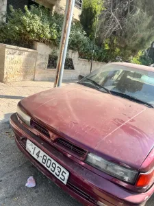 ميتسوبيشي لانسر 91 معها ترخيص لا اخر شهر واحد 2