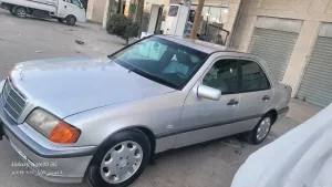 بسم الله الرحمن الرحيمللبيمرسيدس بنز C200 موديل 1997 أصلي لون سلفرماتور 2000cc ا 9