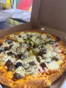 بيتزا ومعجنات الكبير أوي 7
