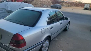 بسم الله الرحمن الرحيمللبيمرسيدس بنز C200 موديل 1997 أصلي لون سلفرماتور 2000cc ا 7