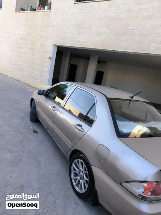 لانسر 2009 للبيع 8