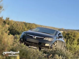 هوندا سيفيك 2006 قير عادي للبيع او البدل على هايبرد بنفس القيمة او لانسر حديثة 8