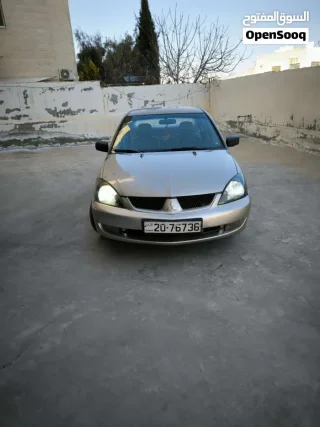 لانسر 2009 للبيع 15