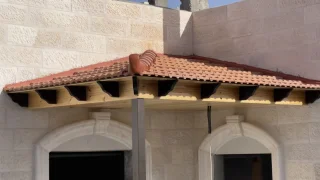 الديرباني لاعمال القرميد والديكورات الخشبية الخارجية