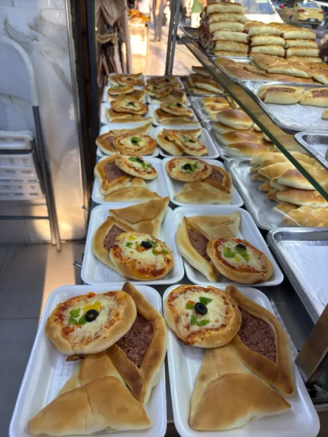 بيتزا ومعجنات فطوطه 3