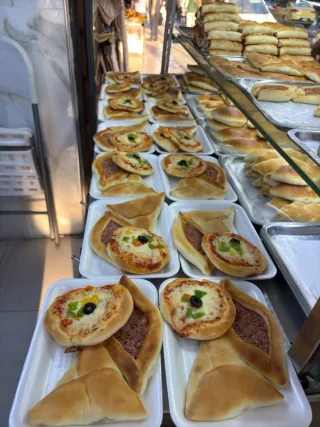 بيتزا ومعجنات فطوطه 3