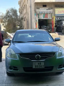 نيسان التيما هايبرد 10