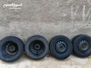 جنط 15 اصلي مع 4 فردات كوشوك بحالة جيدة و 4 طاسات أصلية 6