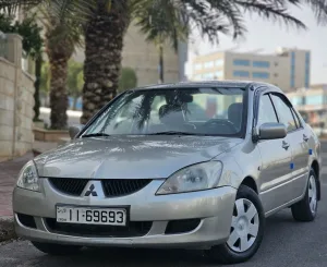متسوبيشي لانسر فحص كامل 2009 اقساط 2