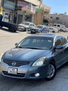 نيسان التيما هايبرد 13