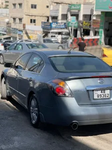 نيسان التيما هايبرد 4