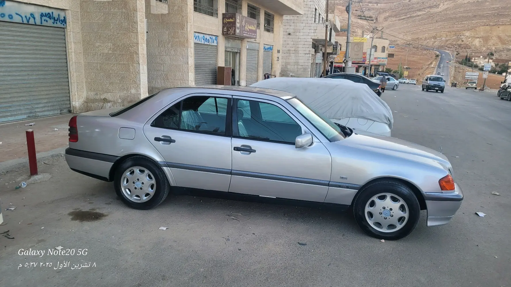 بسم الله الرحمن الرحيمللبيمرسيدس بنز C200 موديل 1997 أصلي لون سلفرماتور 2000cc ا