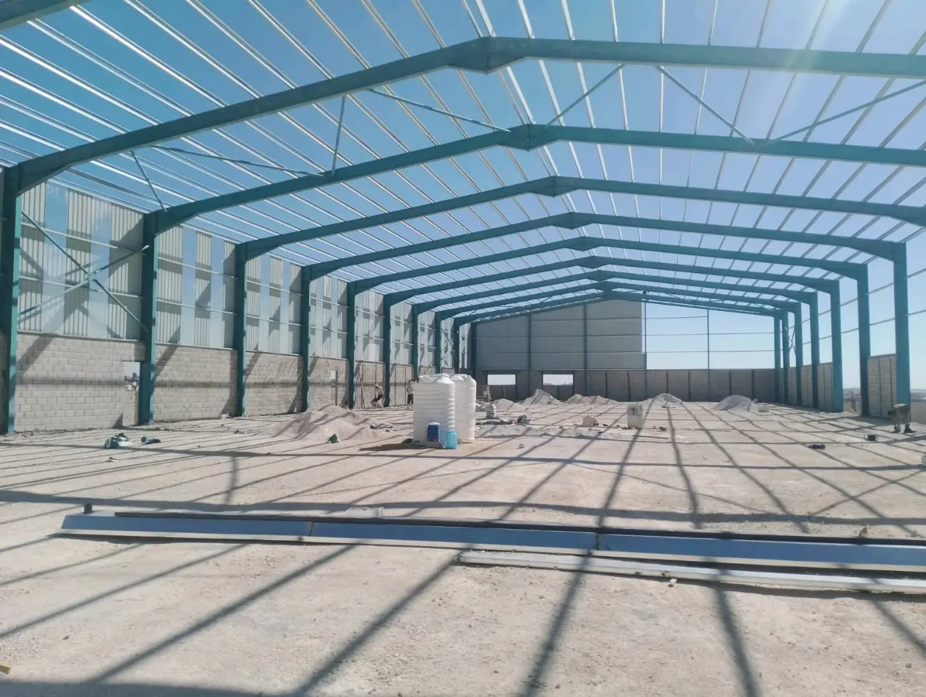 بناء الهناجر و الهياكل المعدنية و المباني الحديدية و المكاتب و الابنية متعددة ال