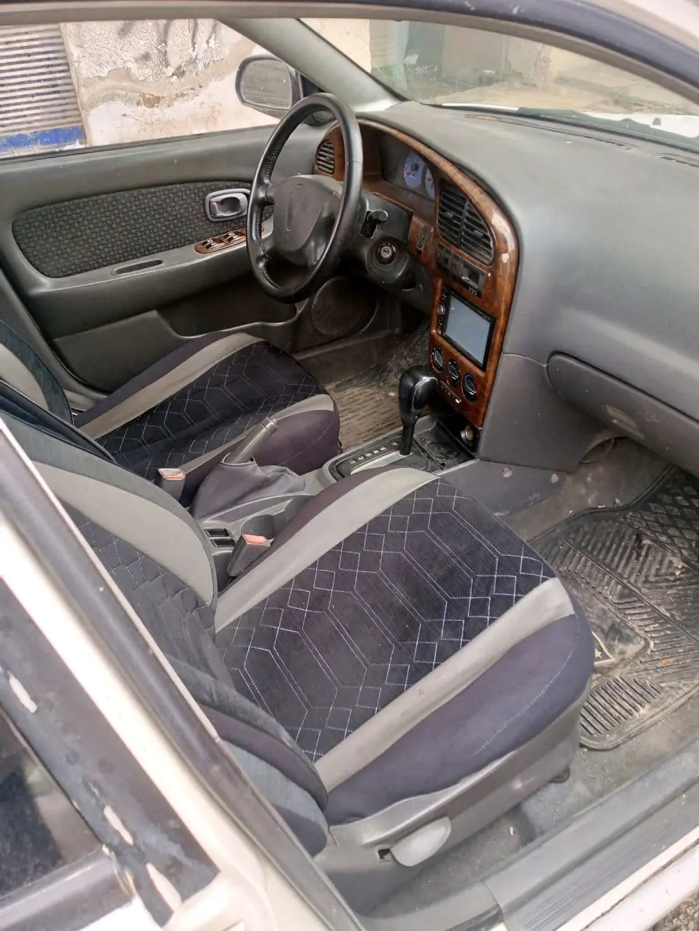 كيا وينج اوتامتيك 2004