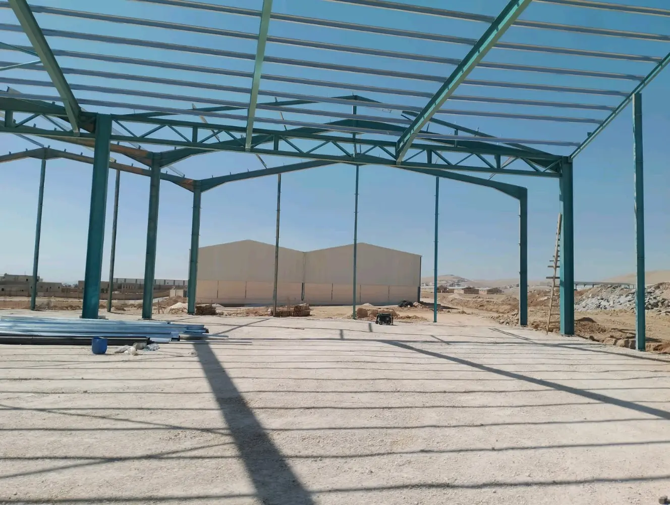 بناء الهناجر و الهياكل المعدنية و المباني الحديدية و المكاتب و الابنية متعددة ال