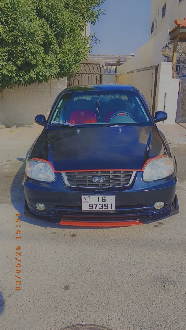 اكسنت 2003