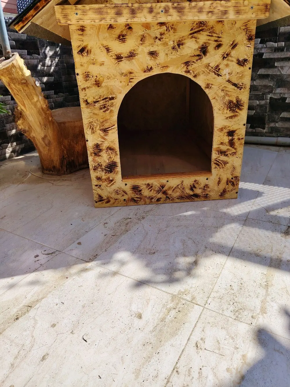 wooden house for dogs different types and sizes isolated from water and warm