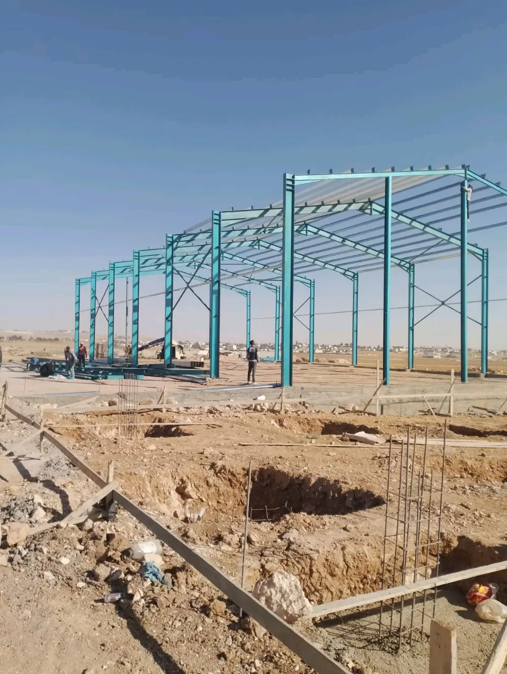 بناء الهناجر و الهياكل المعدنية و المباني الحديدية و المكاتب و الابنية متعددة ال