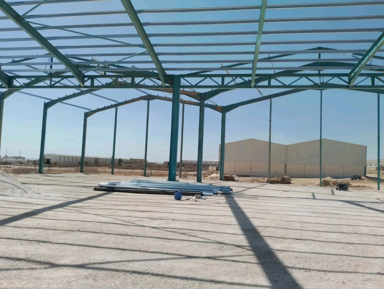 بناء الهناجر و الهياكل المعدنية و المباني الحديدية و المكاتب و الابنية متعددة ال